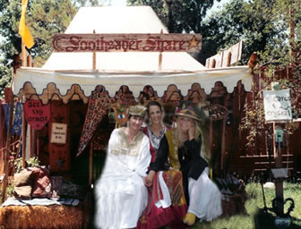 photo of Share, Lady Brenda, and Catharae in front of Share's booth at the 2007 Ren Faire